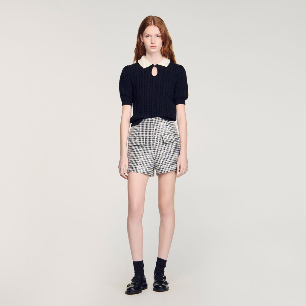 Pull en maille torsadée col perlé