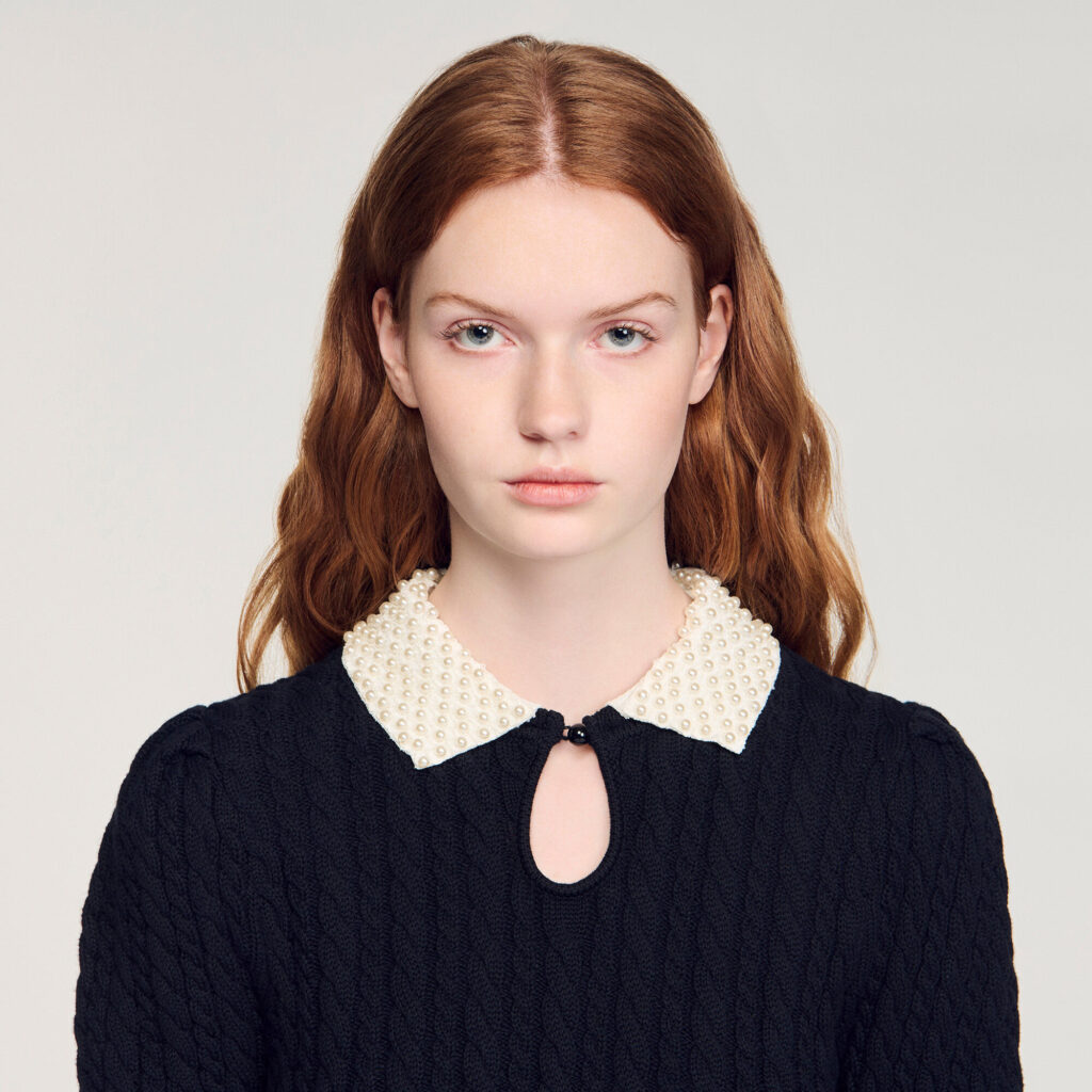 Pull en maille torsadée col perlé
