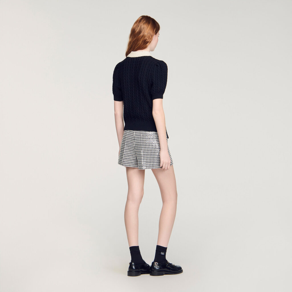 Pull en maille torsadée col perlé